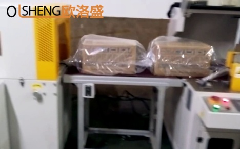整箱干燥劑熱收縮包膜機案例視頻